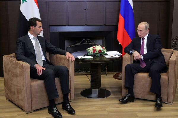 Президент РФ Владимир Путин и президент Сирии Башар Асад во время встречи Президент РФ Владимир Путин и президент Сирии Башар Асад во время встречи