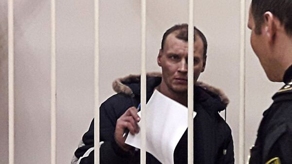 Дмитрий Лукьяненко, обвиняемый в организации взрыва в магазине Перекресток на Кондратьевском проспекте, на заседании Калининского суда Санкт-Петербурга. 31 декабря 2017 Дмитрий Лукьяненко, обвиняемый в организации взрыва в магазине Перекресток на Кондратьевском проспекте, на заседании Калининского суда Санкт-Петербурга. 31 декабря 2017