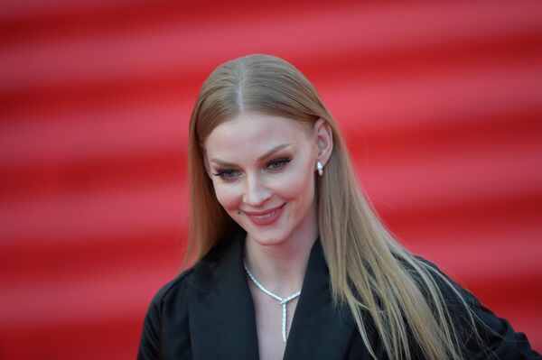 Актриса Светлана Ходченкова на церемонии открытия 38-го Московского международного кинофестиваля в Москве Актриса Светлана Ходченкова на церемонии открытия 38-го Московского международного кинофестиваля в Москве