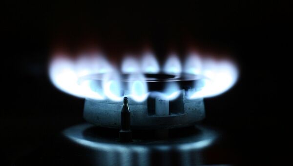Пламя газовой конфорки Пламя газовой конфорки