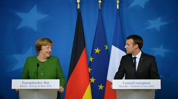 Канцлер Германии Ангела Меркель и президент Франции Эммануэль Макрон на саммите ЕС в Брюсселе. 23 марта 2018 Канцлер Германии Ангела Меркель и президент Франции Эммануэль Макрон на саммите ЕС в Брюсселе. 23 марта 2018