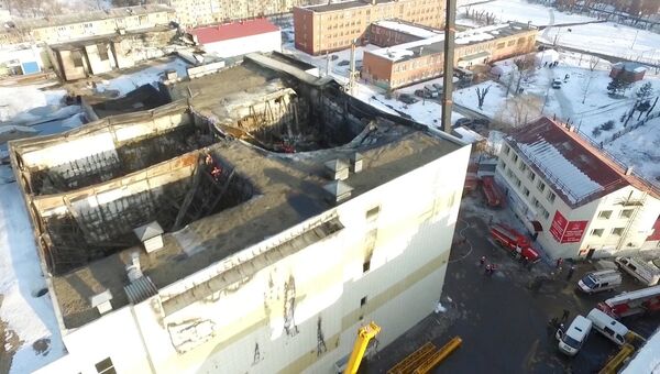 Здание торгового центра Зимняя вишня в Кемерово, где произошел пожар. 26 марта 2018 Здание торгового центра Зимняя вишня в Кемерово, где произошел пожар. 26 марта 2018