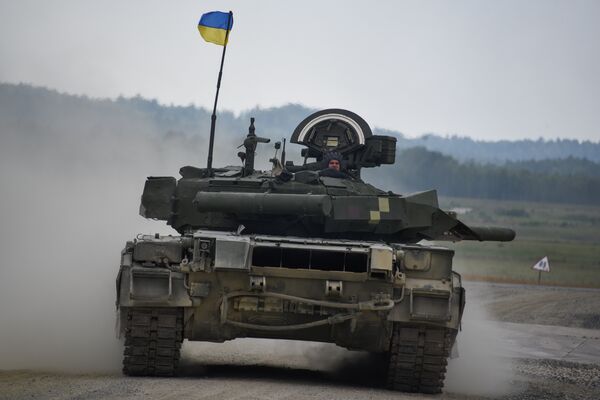 Украинские военные из 14-й волынской механизированной бригады ВСУ на танке Т-84 во время соревнований Strong Europe Tank Challenge в городе Графенвер, Германия. 6 июня 2018 Украинские военные из 14-й волынской механизированной бригады ВСУ на танке Т-84 во время соревнований Strong Europe Tank Challenge в городе Графенвер, Германия. 6 июня 2018
