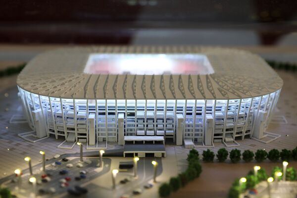 Макет стадиона Ras Abu Aboud Stadium, представленный на выставке футбольной атрибутики Qatar @RoadTo2022 Exhibition в ГУМе в Москве Макет стадиона Ras Abu Aboud Stadium, представленный на выставке футбольной атрибутики Qatar @RoadTo2022 Exhibition в ГУМе в Москве
