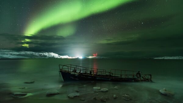 Работа фотографа Michael Zav'yalov Aurora Borealis on the coast of the Barents sea, вошедшая в шорт-лист Insight Astronomy Photographer of the Year 2018 Работа фотографа Michael Zav'yalov Aurora Borealis on the coast of the Barents sea, вошедшая в шорт-лист Insight Astronomy Photographer of the Year 2018