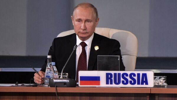 Президент РФ Владимир Путин принимает участие во встрече лидеров БРИКС на саммите в Йоханнесбурге. 27 июля 2018 Президент РФ Владимир Путин принимает участие во встрече лидеров БРИКС на саммите в Йоханнесбурге. 27 июля 2018