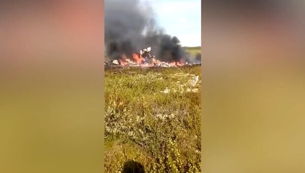 Кадры с места крушения вертолета Ми-8 в Красноярском крае Кадры с места крушения вертолета Ми-8 в Красноярском крае