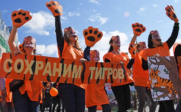 Участники праздничных мероприятий, посвященных Дню тигра, во Владивостоке Участники праздничных мероприятий, посвященных Дню тигра, во Владивостоке