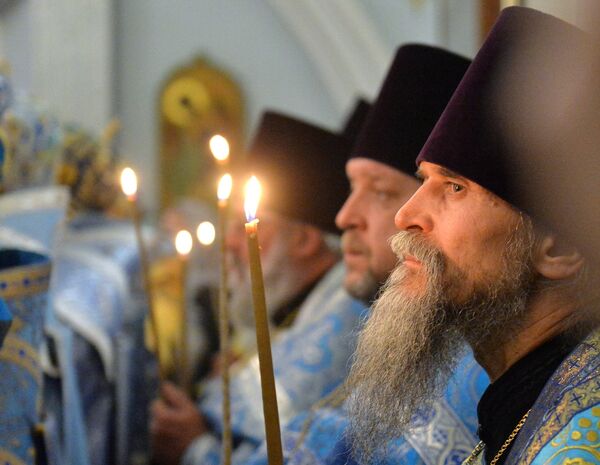 Священнослужители во время богослужения в Свято-Духовом кафедральном соборе в Минске Священнослужители во время богослужения в Свято-Духовом кафедральном соборе в Минске