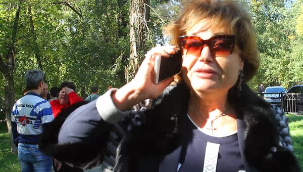 Директор Керченского политехнического колледжа Ольга Гребенникова у колледжа, в котором произошел взрыв Директор Керченского политехнического колледжа Ольга Гребенникова у колледжа, в котором произошел взрыв