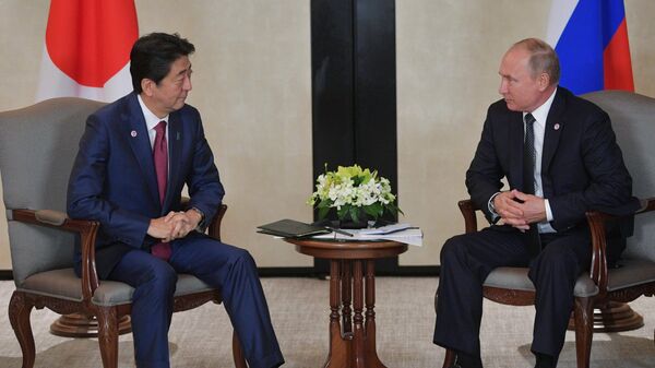 Президент РФ Владимир Путин и премьер-министр Японии Синдзо Абэ Президент РФ Владимир Путин и премьер-министр Японии Синдзо Абэ