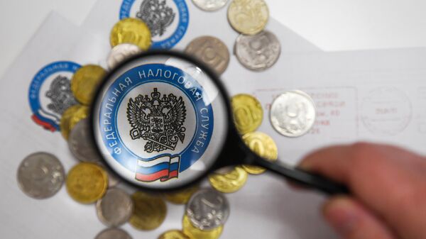 Монеты и конверты с логотипом ФНС РФ Монеты и конверты с логотипом ФНС РФ