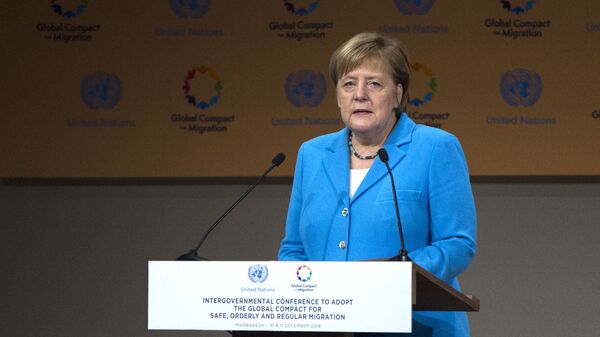 Канцлер Германии Ангела Меркель во время выступления на конференции ООН по миграции в марокканском городе Марракеш. 10 декабря 2018 Канцлер Германии Ангела Меркель во время выступления на конференции ООН по миграции в марокканском городе Марракеш. 10 декабря 2018