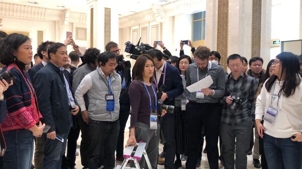 Журналисты ждут доклад по ВВП Китая Журналисты ждут доклад по ВВП Китая