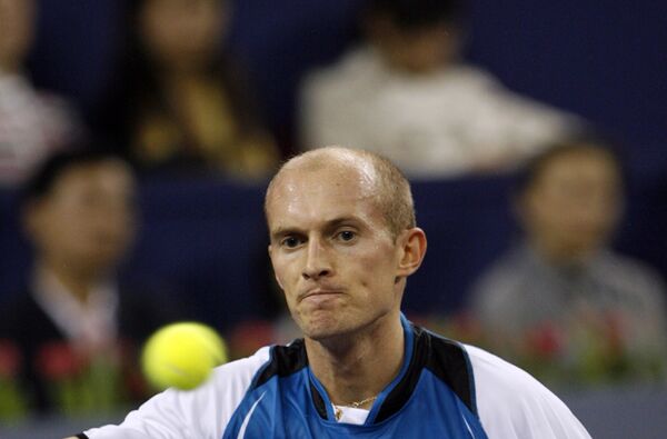Николай Давыденко в матче против дель Потро на итоговом турнире ATP в Шанхае Николай Давыденко в матче против дель Потро на итоговом турнире ATP в Шанхае