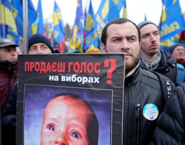 Участник акции с требованием честных выборов в Киеве Участник акции с требованием честных выборов в Киеве