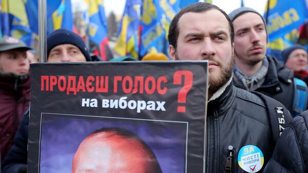 Участник акции с требованием честных выборов в Киеве Участник акции с требованием честных выборов в Киеве