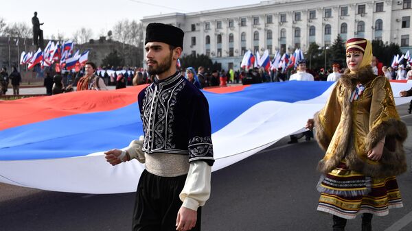 Праздничное шествие, посвященное 5-й годовщине Общекрымского референдума 2014 года и воссоединения Крыма с Россией, в Симферополе
