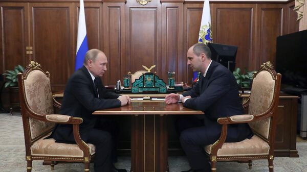 Владимир Путин во время рабочей встречи с Денисом Паслером. 21 марта 2019 Владимир Путин во время рабочей встречи с Денисом Паслером. 21 марта 2019
