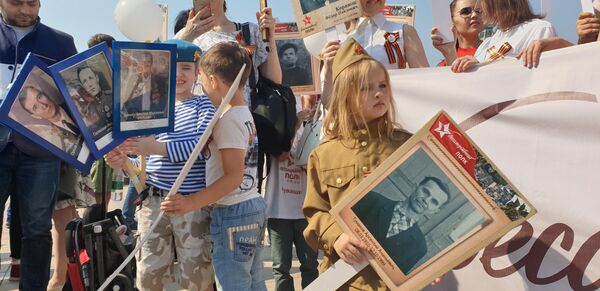 Участники акции Бессмертный полк в Пекине, КНР Участники акции Бессмертный полк в Пекине, КНР