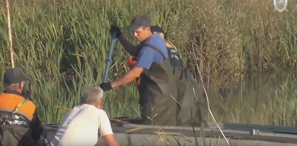Спасатели ищут тело второго ребенка Спасатели ищут тело второго ребенка