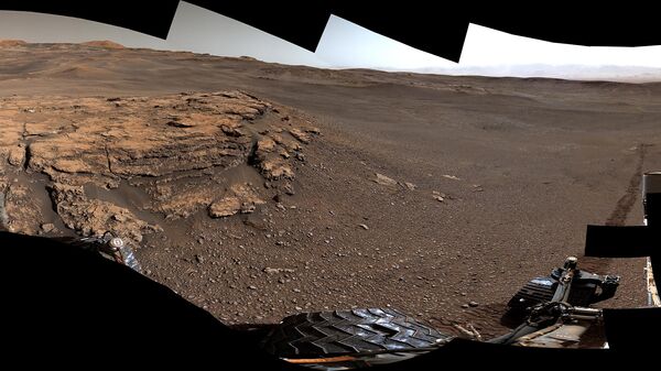 Фотография залежей глины, открытых марсоходом Curiosity на склонах горы Шарп в кратере Гейл Фотография залежей глины, открытых марсоходом Curiosity на склонах горы Шарп в кратере Гейл