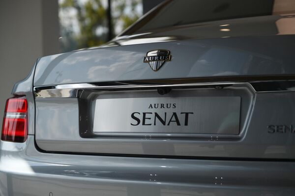 Автомобиль Aurus Senat в первом шоуруме по коммерческим продажам отечественных машин для первых лиц государства проекта Кортеж в деловом центре Москва-Сити Автомобиль Aurus Senat в первом шоуруме по коммерческим продажам отечественных машин для первых лиц государства проекта Кортеж в деловом центре Москва-Сити