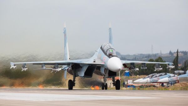 Истребители Су-27 ВКС России на авиабазе Хмеймим в Сирии Истребители Су-27 ВКС России на авиабазе Хмеймим в Сирии
