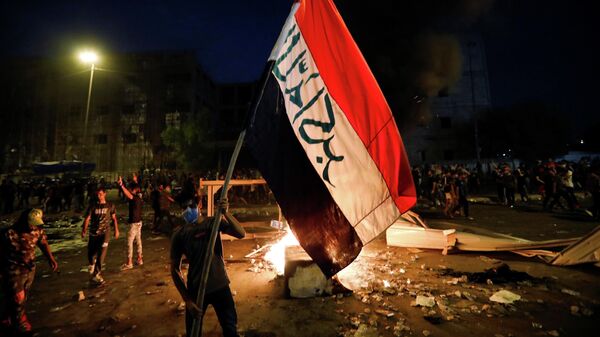 Акция протеста во время комендантского часа в Багдаде, Ирак Акция протеста во время комендантского часа в Багдаде, Ирак