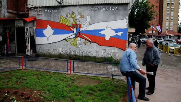 Граффити на стене дома в городе Косовска-Митровица Граффити на стене дома в городе Косовска-Митровица