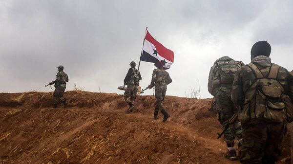 Подразделения сирийской армии недалеко от турецкой границы к северо-востоку от Эль-Хасаки Подразделения сирийской армии недалеко от турецкой границы к северо-востоку от Эль-Хасаки