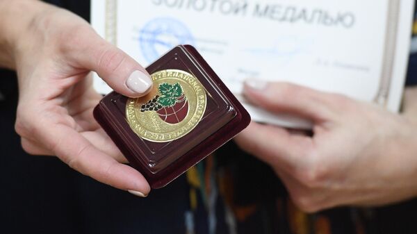 Золотая медаль победителя XXIII Международного конкурса вин и спиртных напитков Золотая медаль победителя XXIII Международного конкурса вин и спиртных напитков
