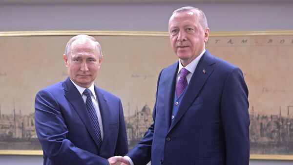 Президент РФ Владимир Путин и президент Турции Реджеп Тайип Эрдоган во время встречи в конгресс-центре Халич в Стамбуле. 8 января 2020 Президент РФ Владимир Путин и президент Турции Реджеп Тайип Эрдоган во время встречи в конгресс-центре Халич в Стамбуле. 8 января 2020