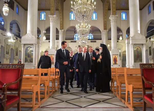 Президент РФ Владимир Путин и президент Сирии Башар Асад в кафедральном соборе Пресвятой Богородицы в Дамаске Президент РФ Владимир Путин и президент Сирии Башар Асад в кафедральном соборе Пресвятой Богородицы в Дамаске