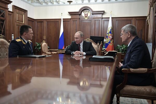 Президент РФ Владимир Путин, руководитель Генеральной прокуратуры РФ Юрий Чайка и заместитель председателя Следственного комитета РФ Игорь Краснов Президент РФ Владимир Путин, руководитель Генеральной прокуратуры РФ Юрий Чайка и заместитель председателя Следственного комитета РФ Игорь Краснов