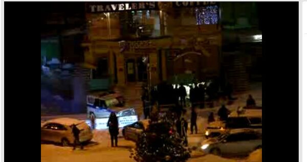 Место взрыва в Новосибирске. Стоп-кадр видеозаписи очевидца Место взрыва в Новосибирске. Стоп-кадр видеозаписи очевидца
