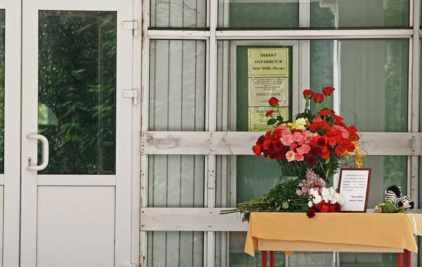 Прощание с погибшими в летнем лагере Азов. Архив Прощание с погибшими в летнем лагере Азов. Архив