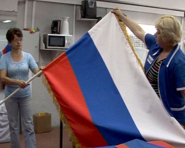 День флага России: как шьют триколор для президента День флага России: как шьют триколор для президента