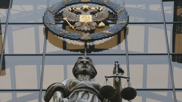 Статуя Фемиды на фасаде здания верховного суда РФ в Москве. Архив Статуя Фемиды на фасаде здания верховного суда РФ в Москве. Архив