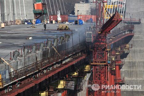 Последствия пожара на строящемся мосту во Владивостоке Последствия пожара на строящемся мосту во Владивостоке