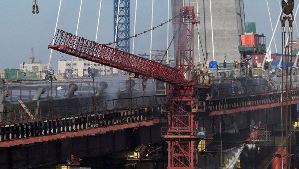 Последствия пожара на строящемся мосту во Владивостоке Последствия пожара на строящемся мосту во Владивостоке