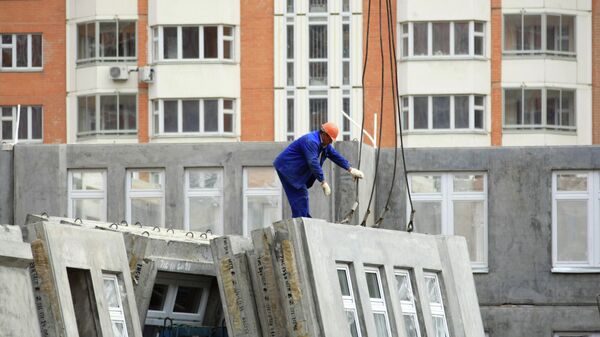 Строительство домов в Москве. Архивное фото Строительство домов в Москве. Архивное фото