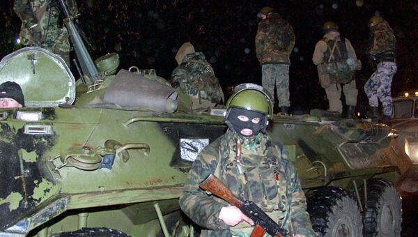 Внутренние войска МВД у здания Театрального центра на Дубровке, захваченного террористами Внутренние войска МВД у здания Театрального центра на Дубровке, захваченного террористами