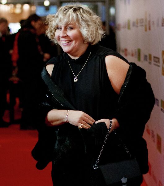 Актриса Марина Голуб перед началом премьеры фильма Мамы Актриса Марина Голуб перед началом премьеры фильма Мамы