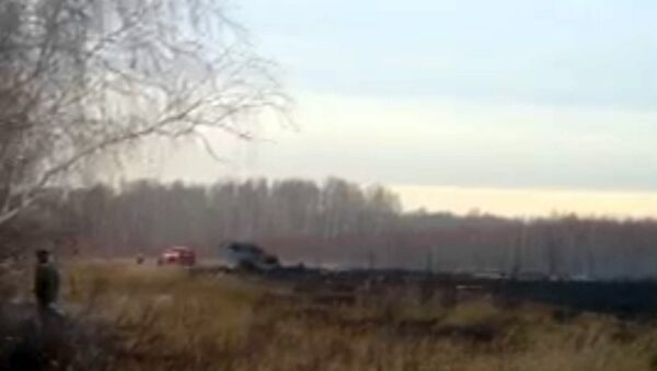 Су-24 рухнул недалеко от аэродрома. Съемка очевидца с места ЧП Су-24 рухнул недалеко от аэродрома. Съемка очевидца с места ЧП