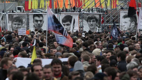 Участники митинга оппозиции на Болотной площади, архивное фото Участники митинга оппозиции на Болотной площади, архивное фото