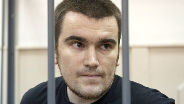Алексей Гаскаров, обвиняемый в участии в массовых беспорядках на Болотной площади 6 мая 2012 года. Архивное фото Алексей Гаскаров, обвиняемый в участии в массовых беспорядках на Болотной площади 6 мая 2012 года. Архивное фото