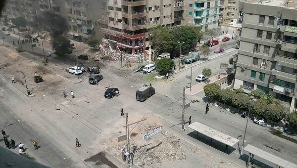 На месте взрыва бомбы в Каире На месте взрыва бомбы в Каире