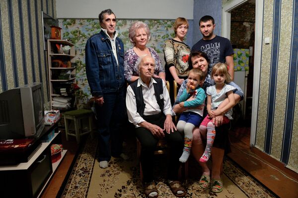 Сибирский долгожитель А.Каптаренко пронес Олимпийский огонь Сибирский долгожитель А.Каптаренко пронес Олимпийский огонь