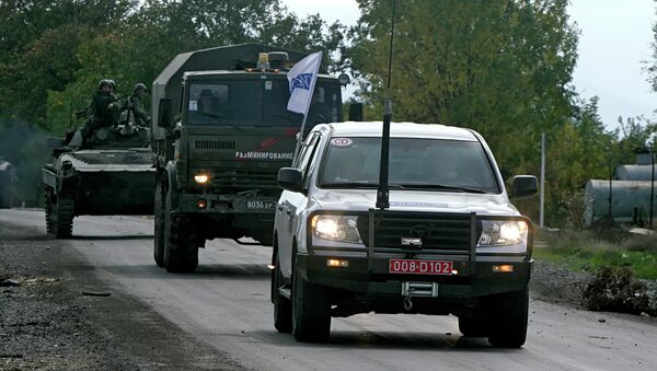 Колонна с наблюдателями ОБСЕ Колонна с наблюдателями ОБСЕ